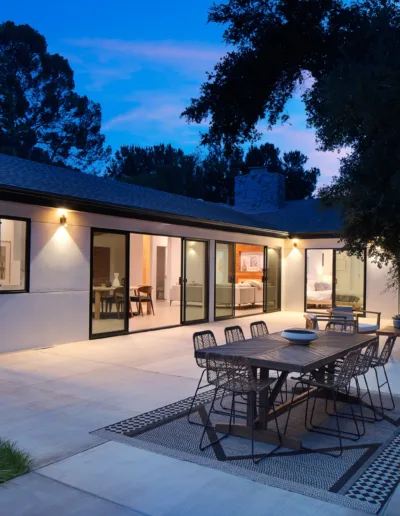 A house with a table and chairs.