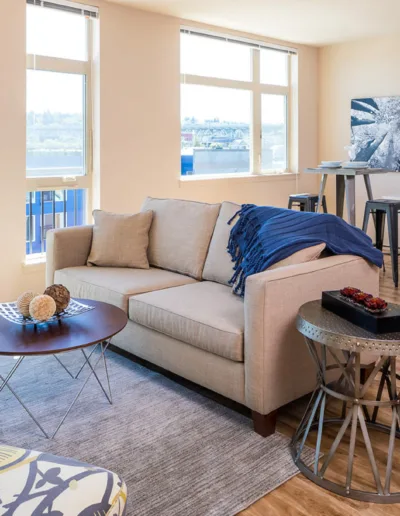 A living room with a couch and a coffee table.