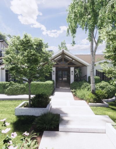 A suburban home with a tudor architectural style featuring a double garage and a landscaped walkway leading to a covered entrance.