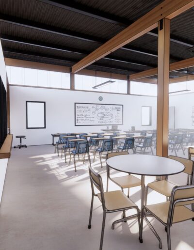 A modern classroom with wooden beams features several desks, chairs, and whiteboards. There is an open area on the right and a small kitchenette with a sink to the left. Sunlight filters through the windows.